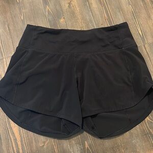 Lululemon not made anymore. Mid rise speed up short 4” inseam.